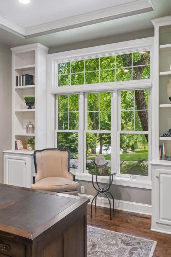 Natural light pours through oversized windows, making this flexible space as inspiring for a productive workday as it is for a cozy afternoon with a good book.