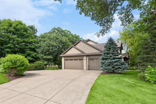 A spacious three-car garage, abundant off-street guest parking, and a walk-up attic provide the storage and convenience that make everyday living just a little easier.