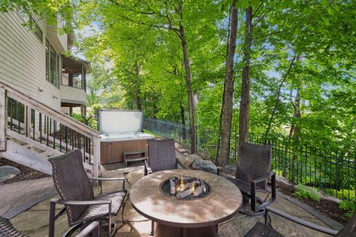 Evenings are made for this peaceful retreat, where the hot tub, fire pit, and tranquil wetland views create the feeling of a favorite "Up North" getaway without ever leaving home.