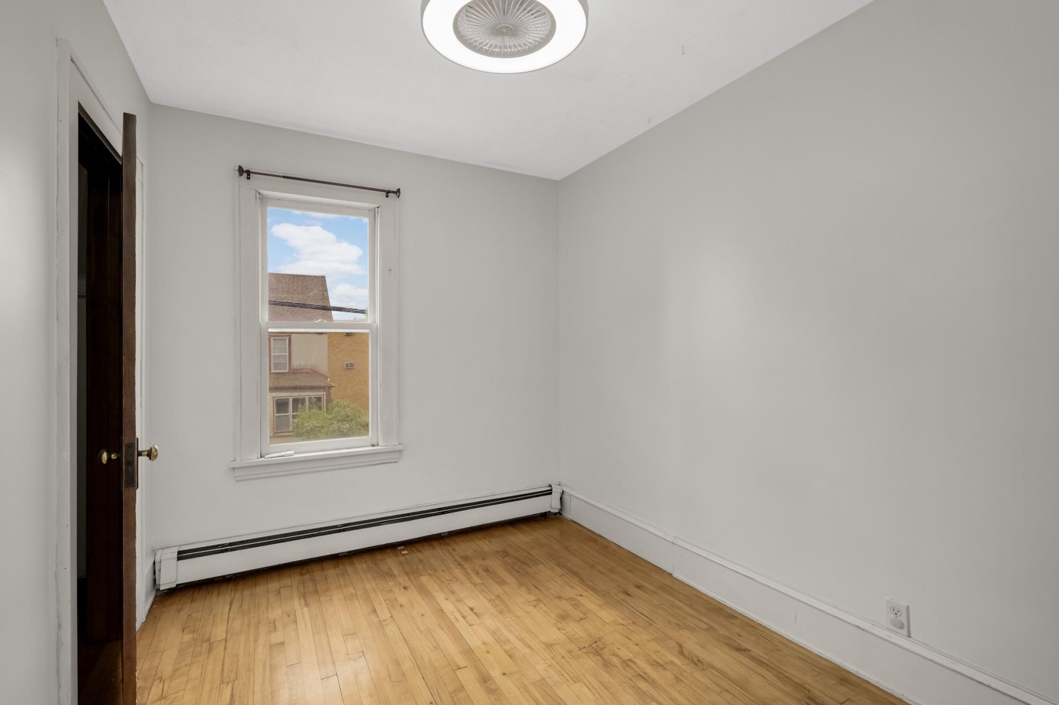 The 3rd bedroom on the upper level also has a convenient walk-in closet