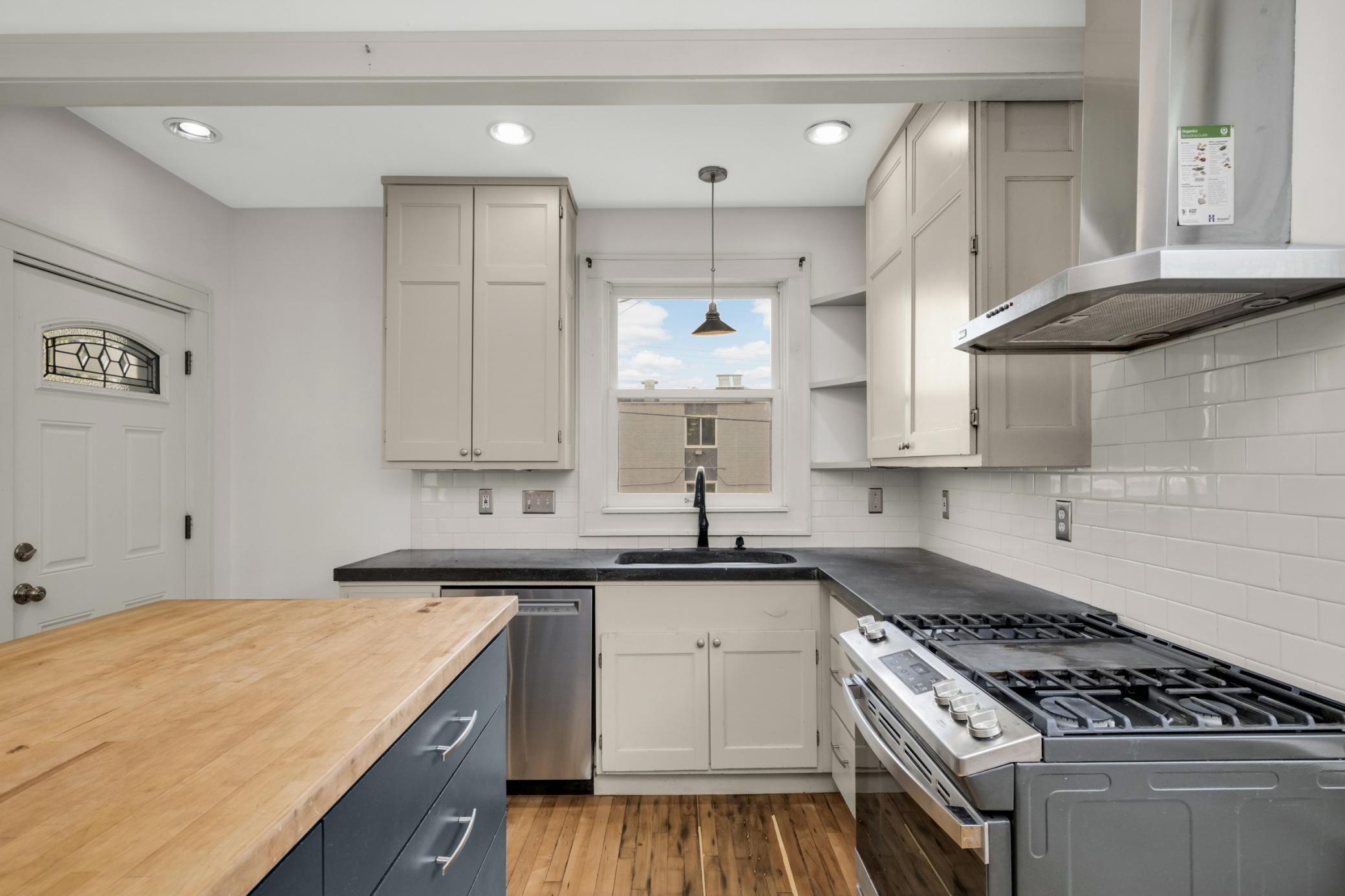 You'll love cooking and hosting in this functional kitchen space with center island