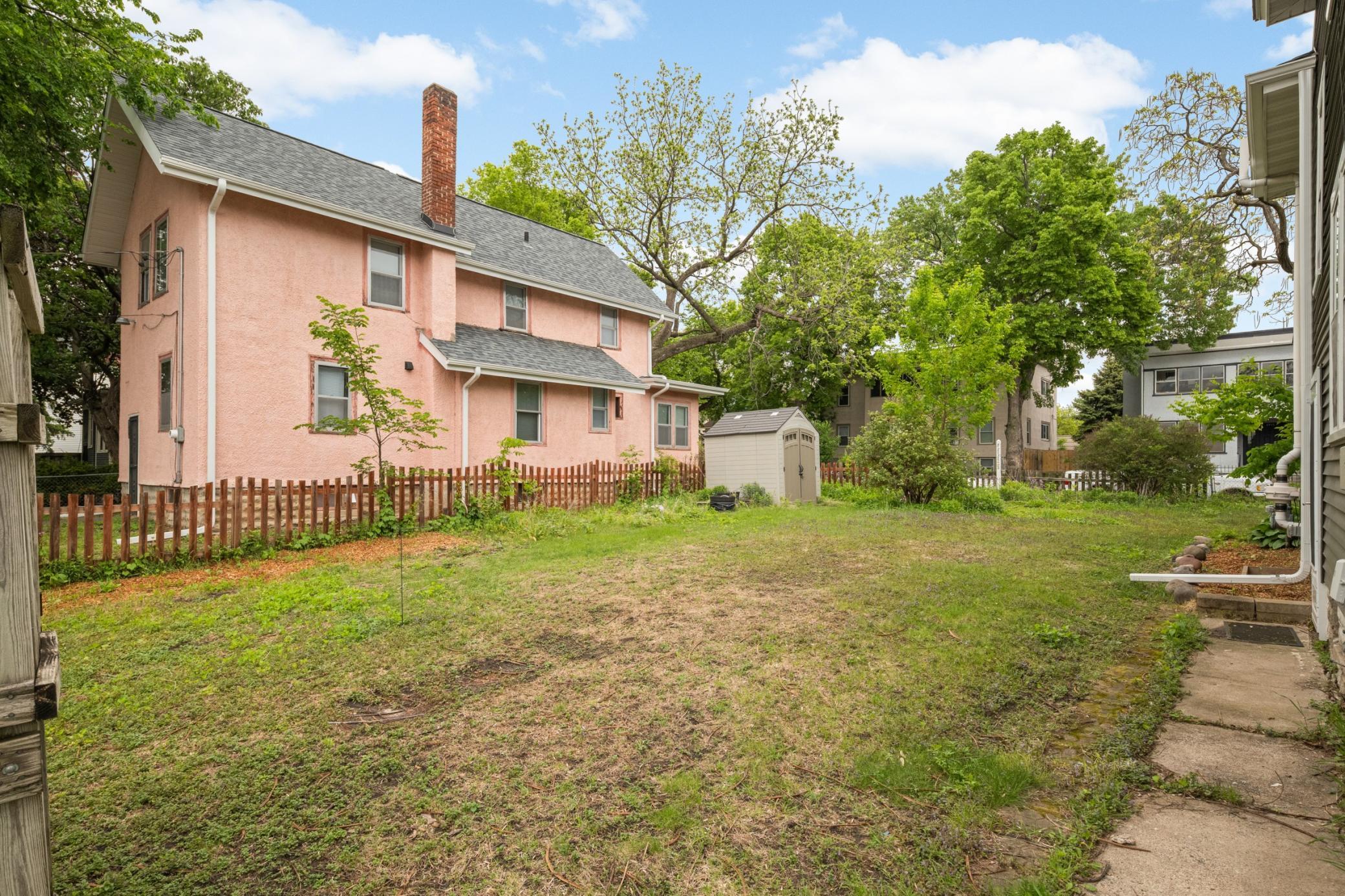 Large side yard -- the listing includes 2 lots being sold together