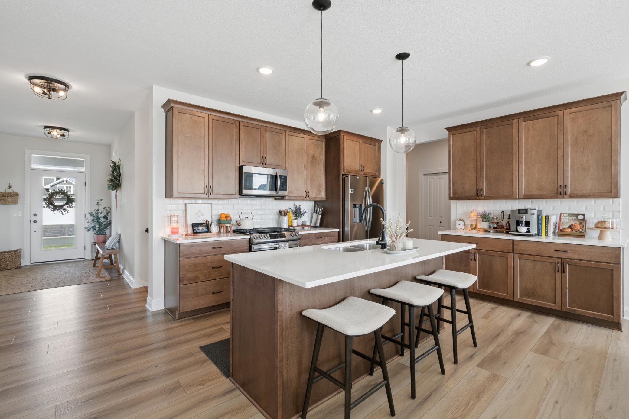 Beautiful wood cabinets steal the show in this kitchen