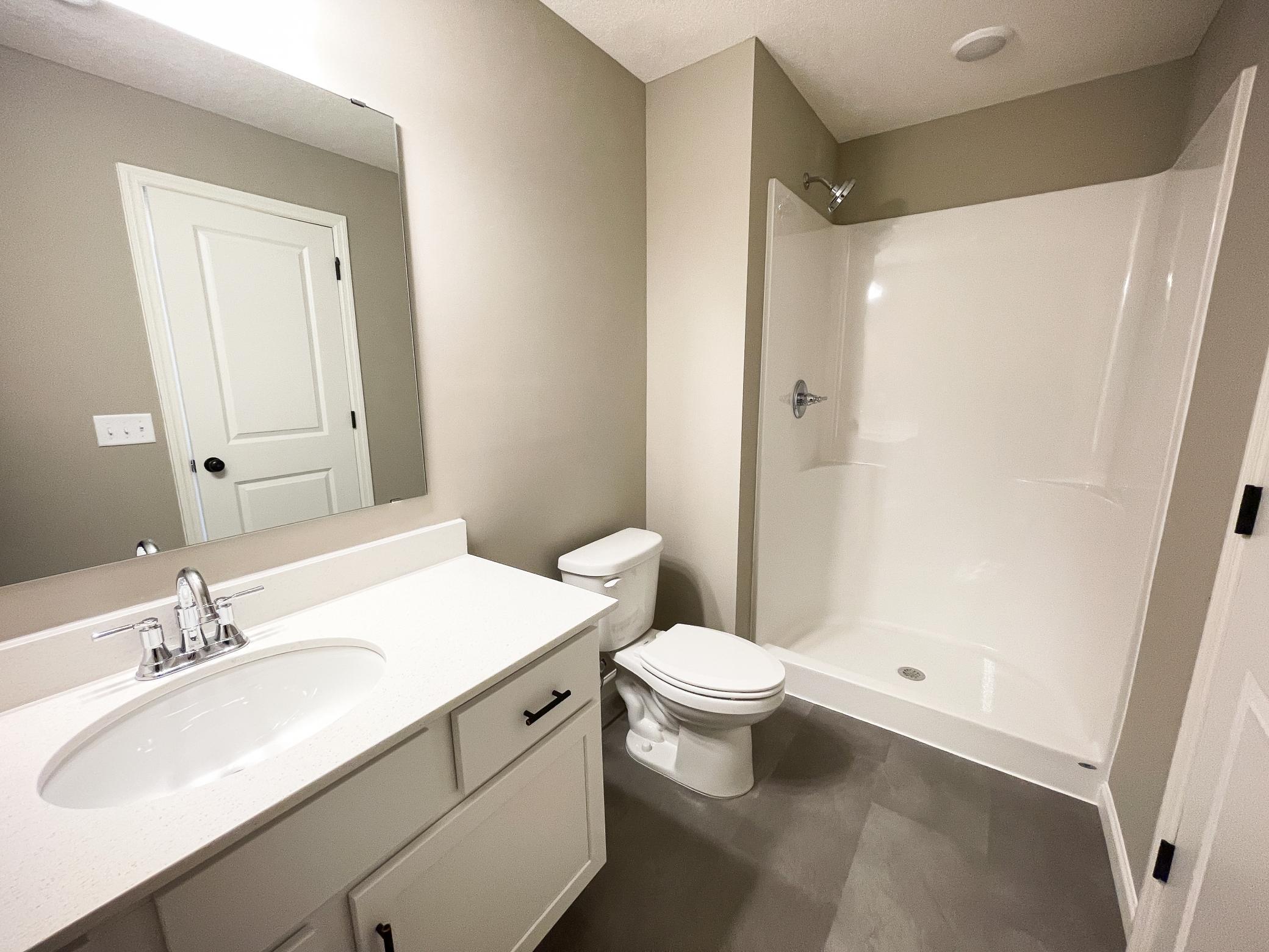 Photo of previously finished home of same floor plan.