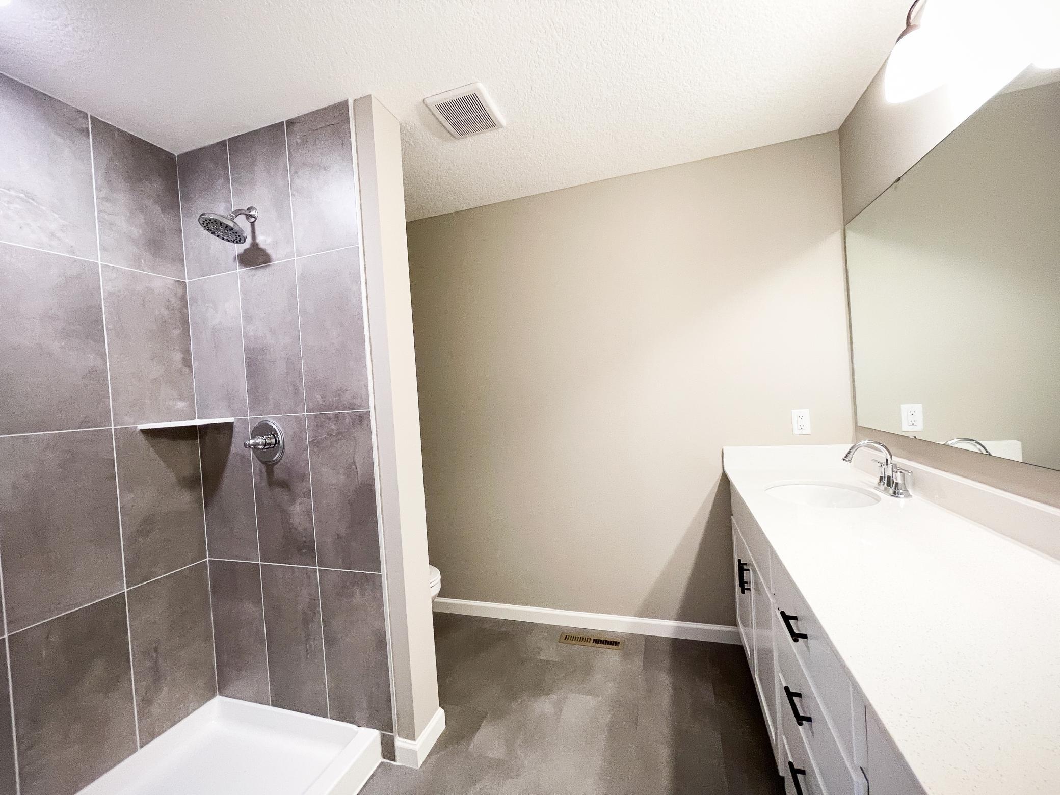 Photo of previously finished home of same floor plan.