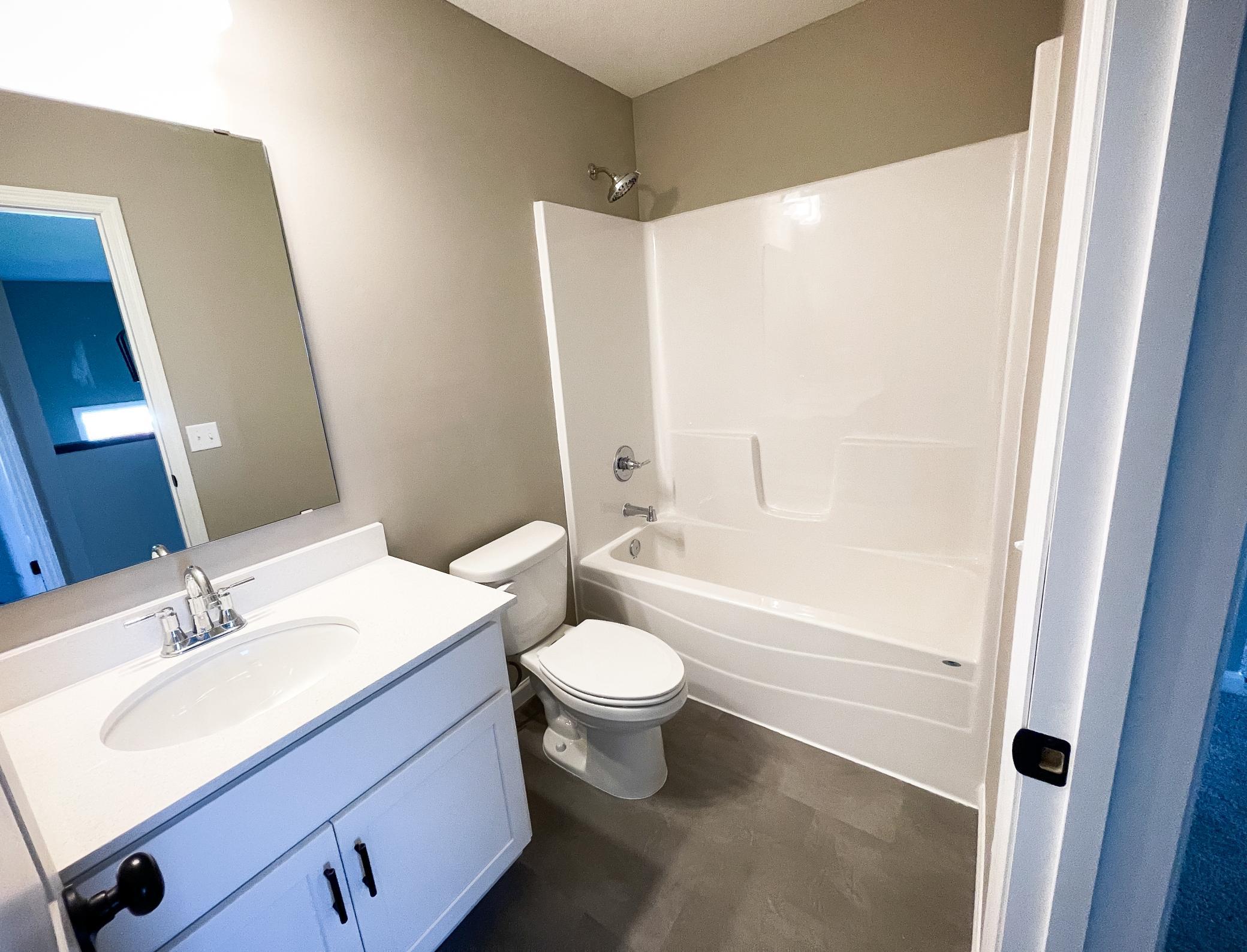 Photo of previously finished home of same floor plan.