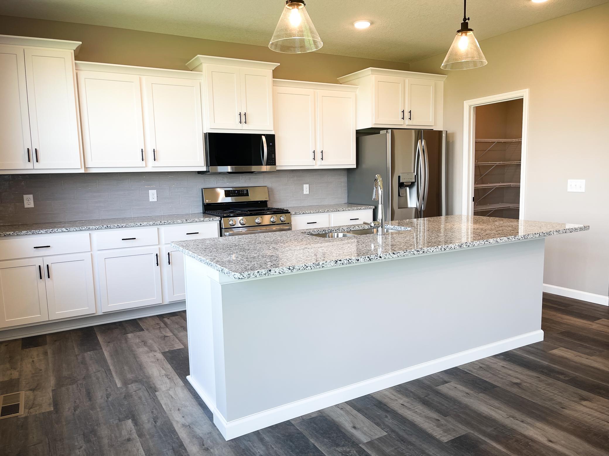 Photo of previously finished home of same floor plan.