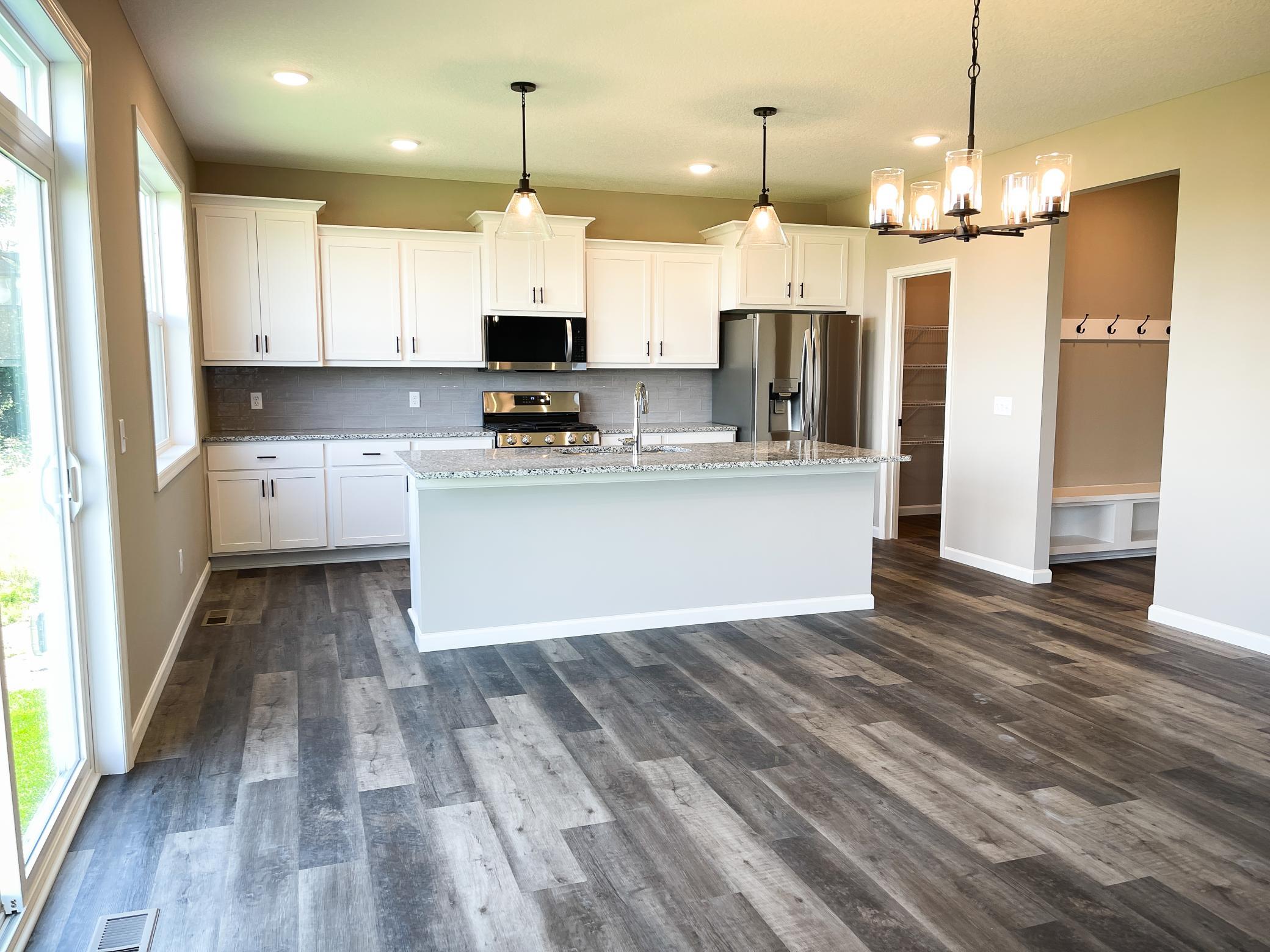 Photo of previously finished home of same floor plan.