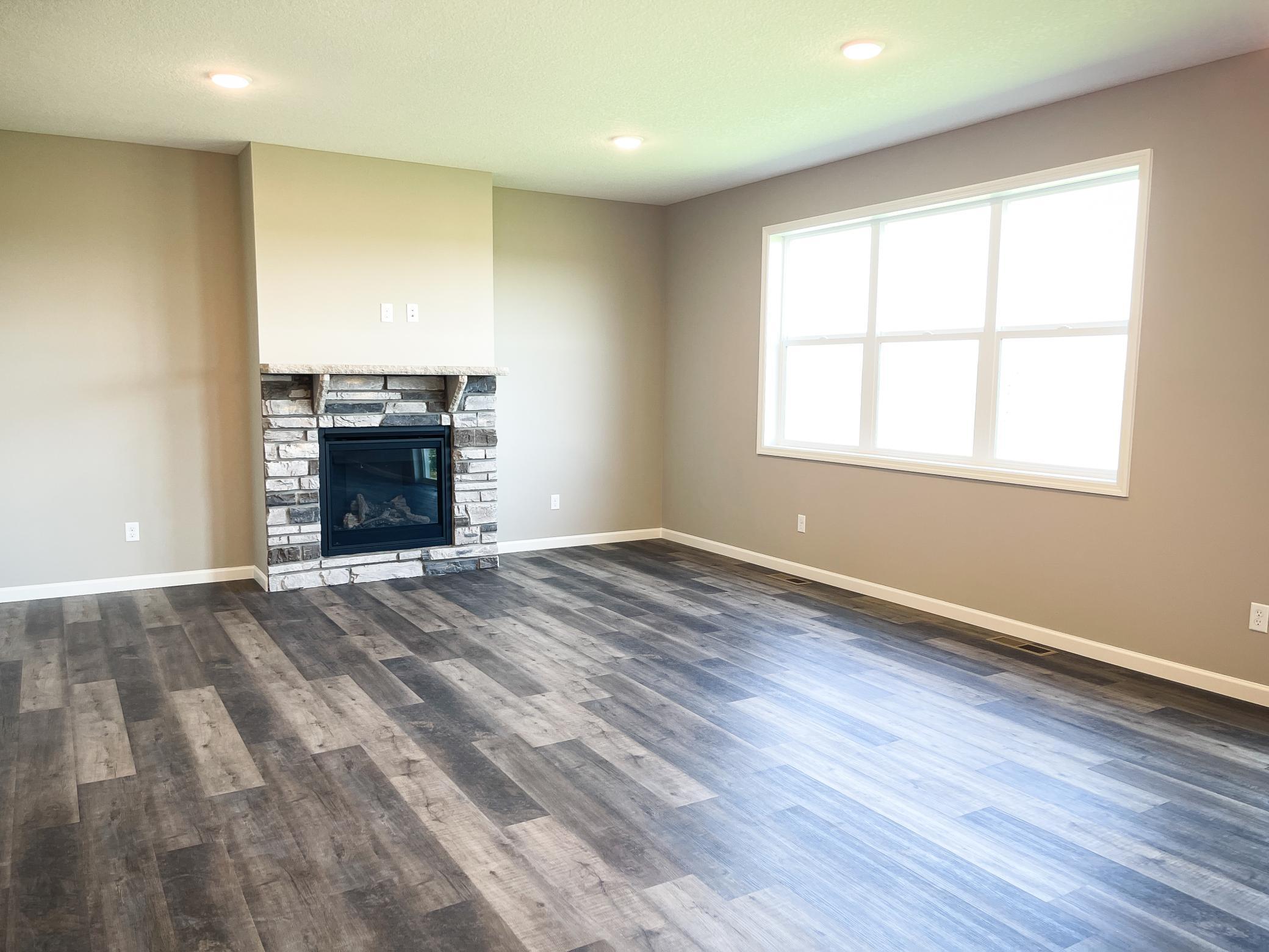 Photo of previously finished home of same floor plan.
