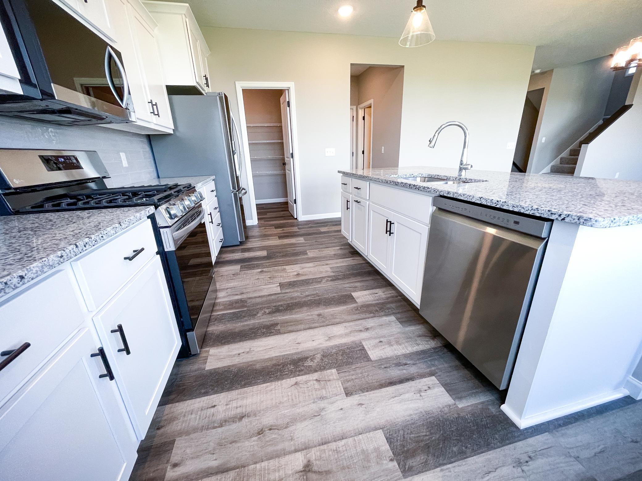 Photo of previously finished home of same floor plan.