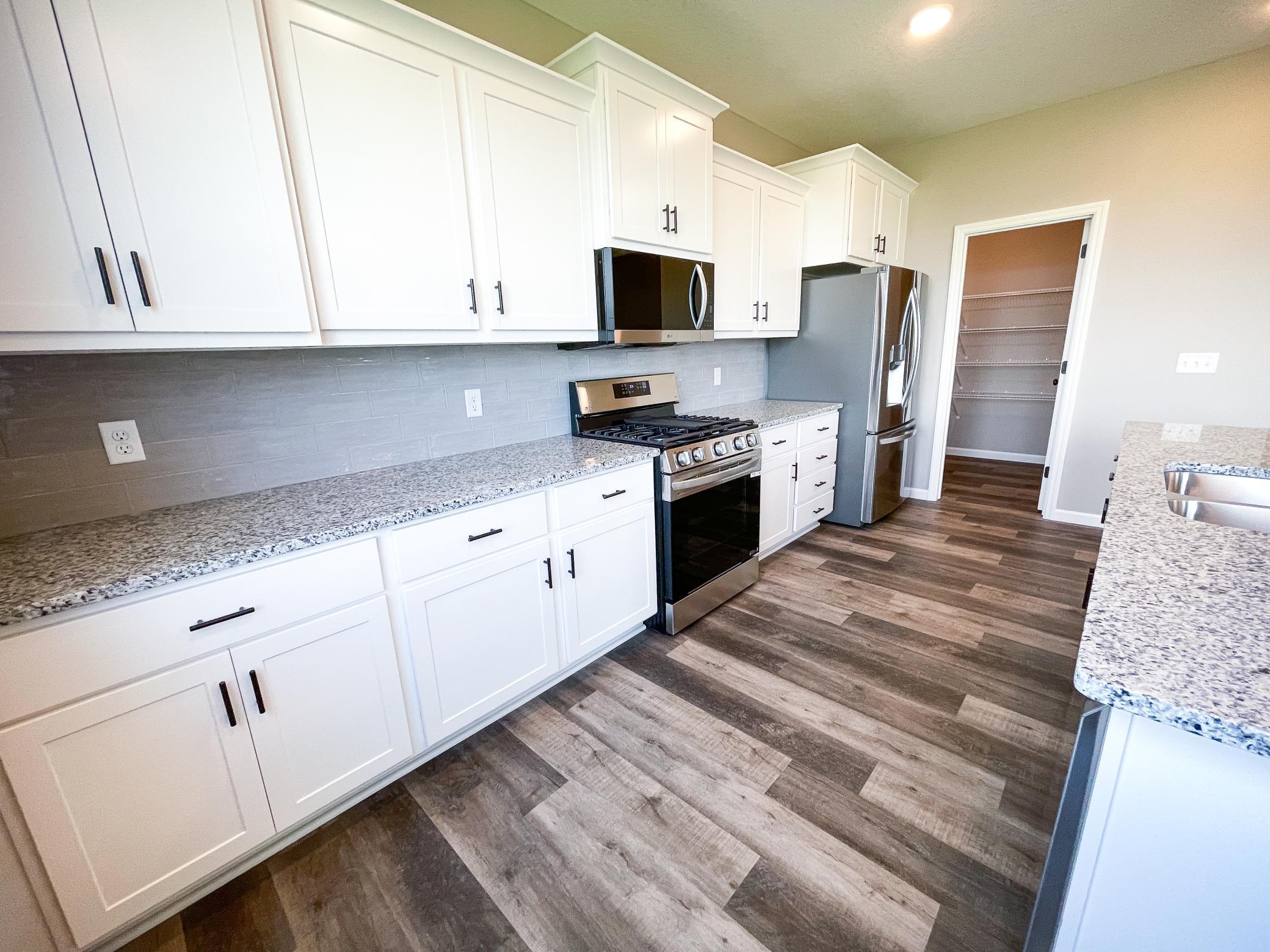 Photo of previously finished home of same floor plan.
