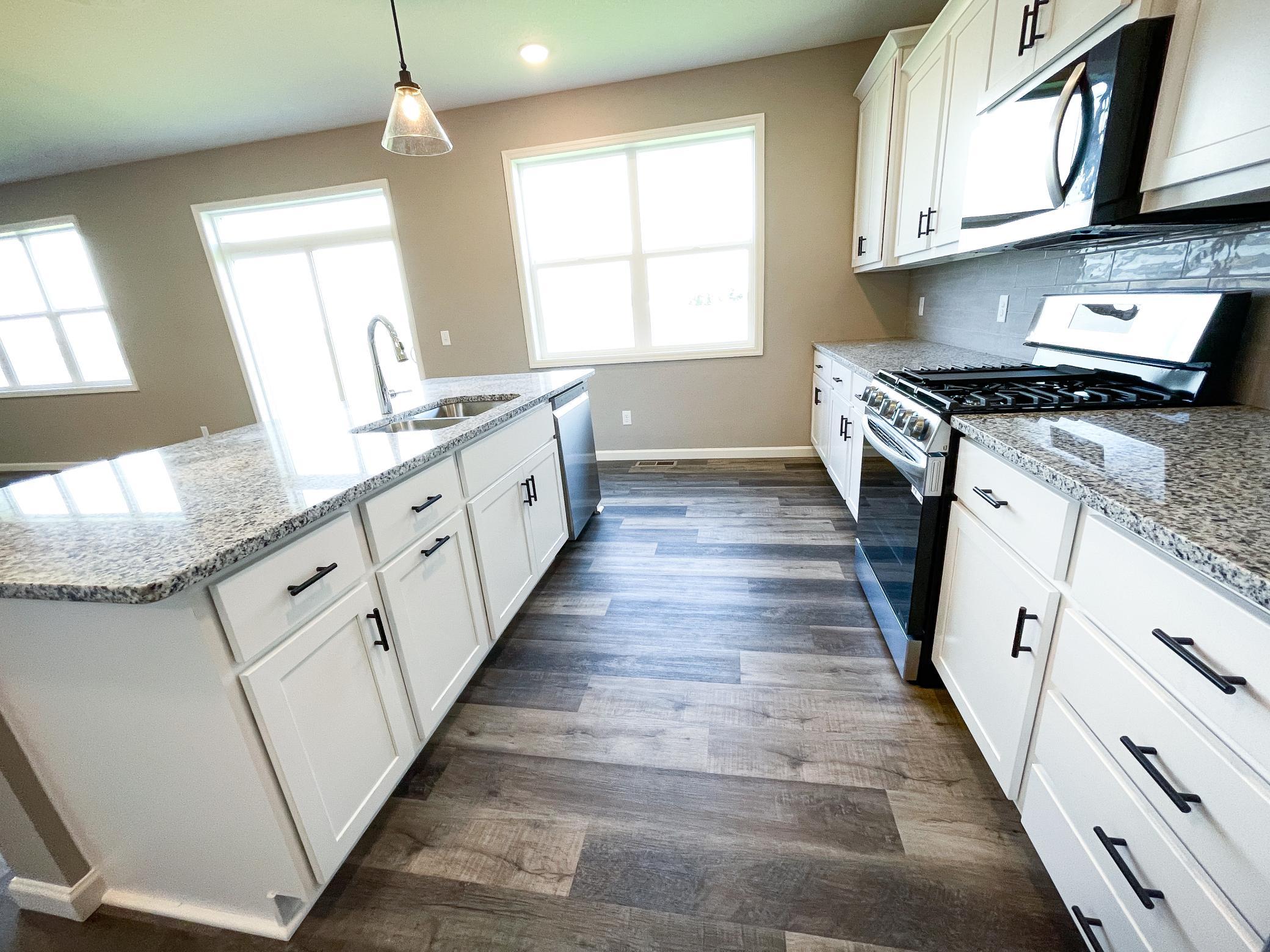 Photo of previously finished home of same floor plan.