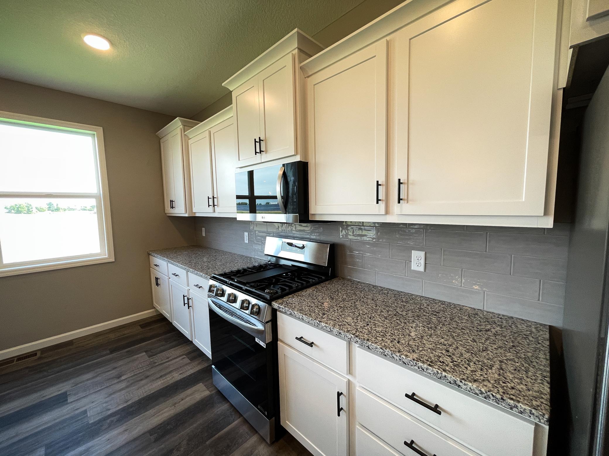 Photo of previously finished home of same floor plan.