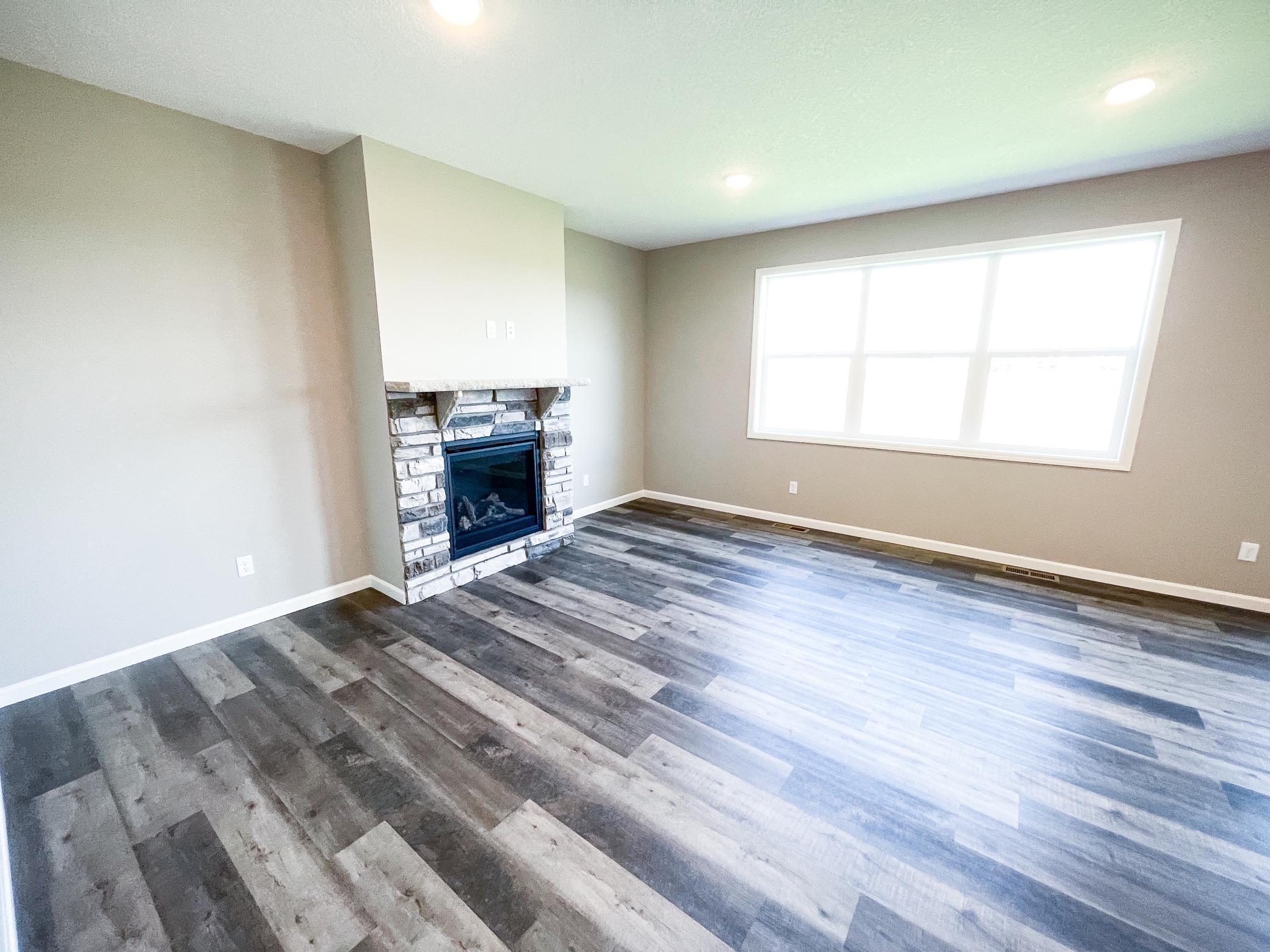 Photo of previously finished home of same floor plan.
