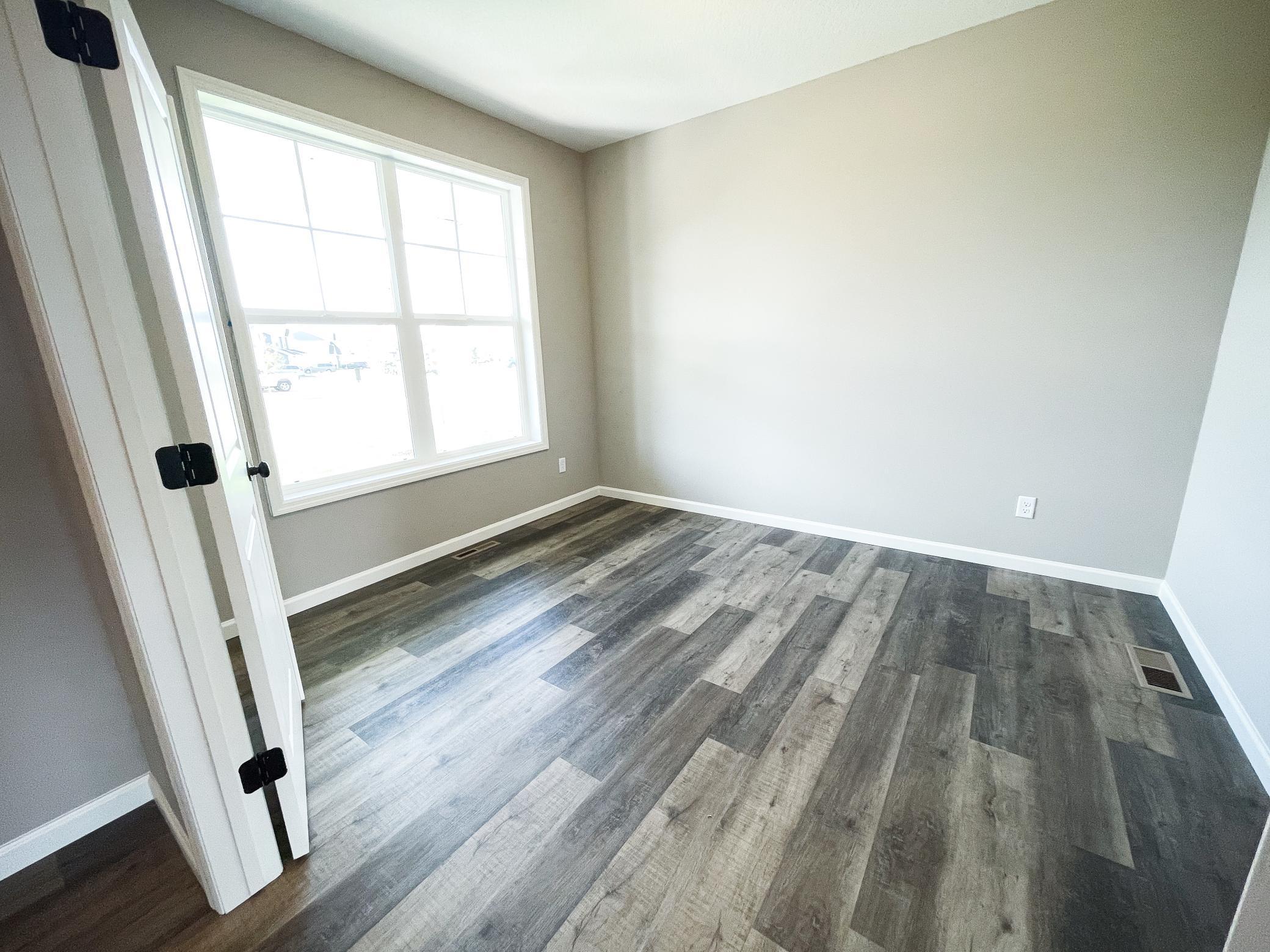 Photo of previously finished home of same floor plan.