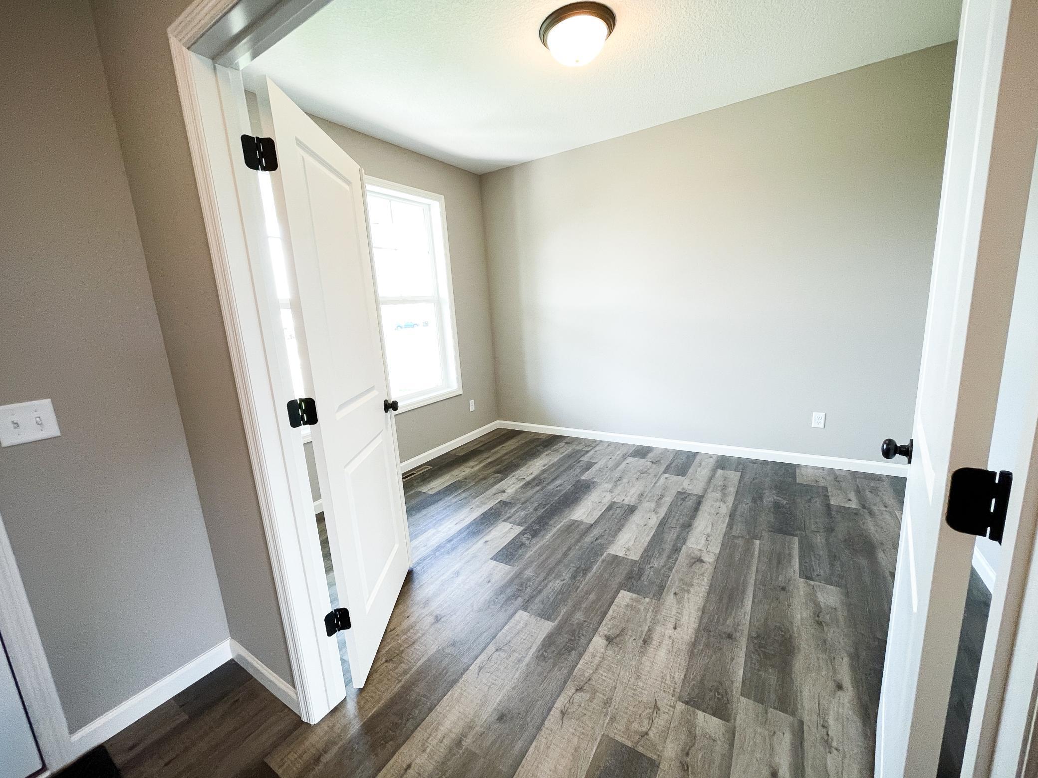 Photo of previously finished home of same floor plan.