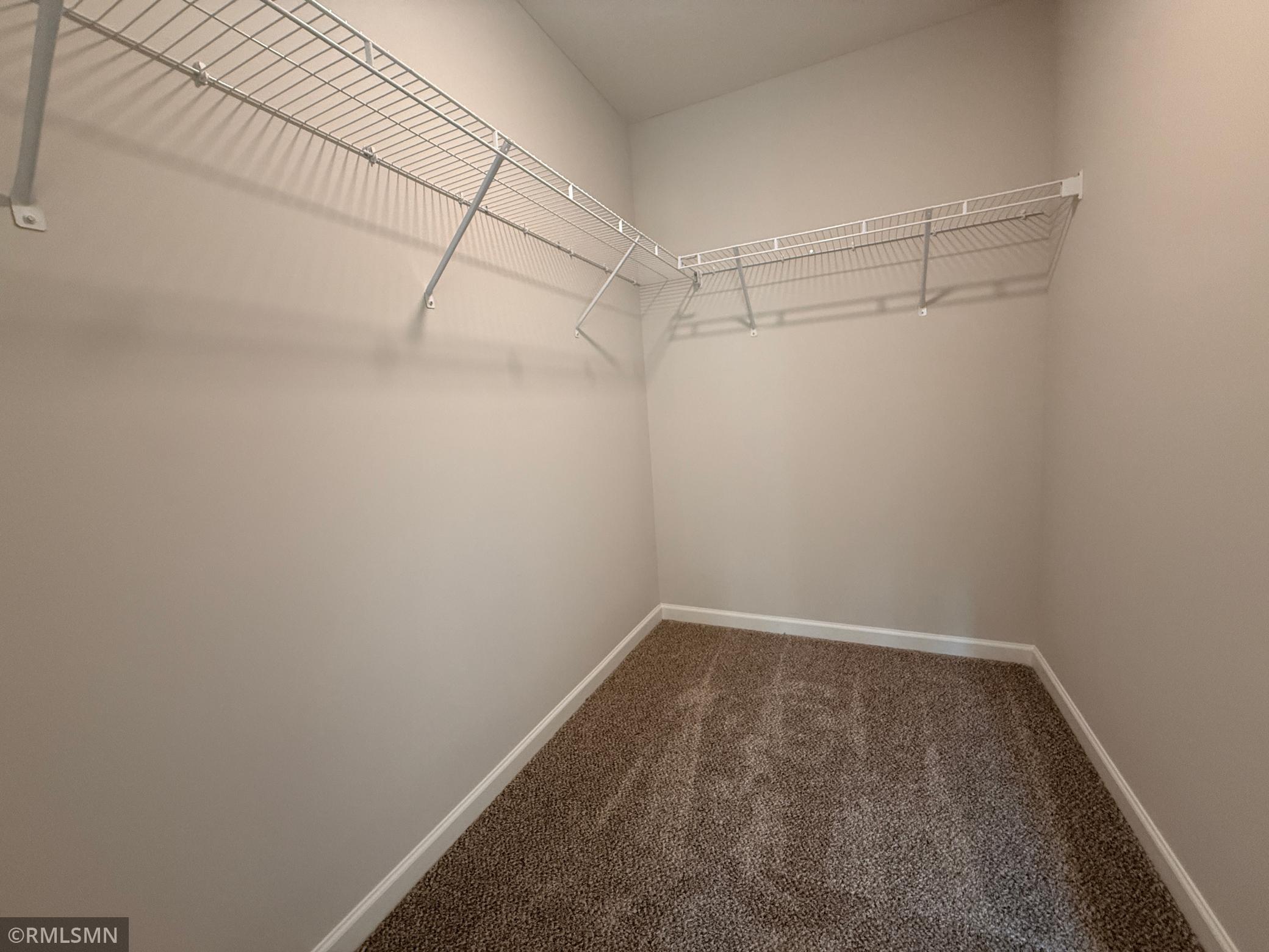 The owner's suite closet provides lots of storage space.