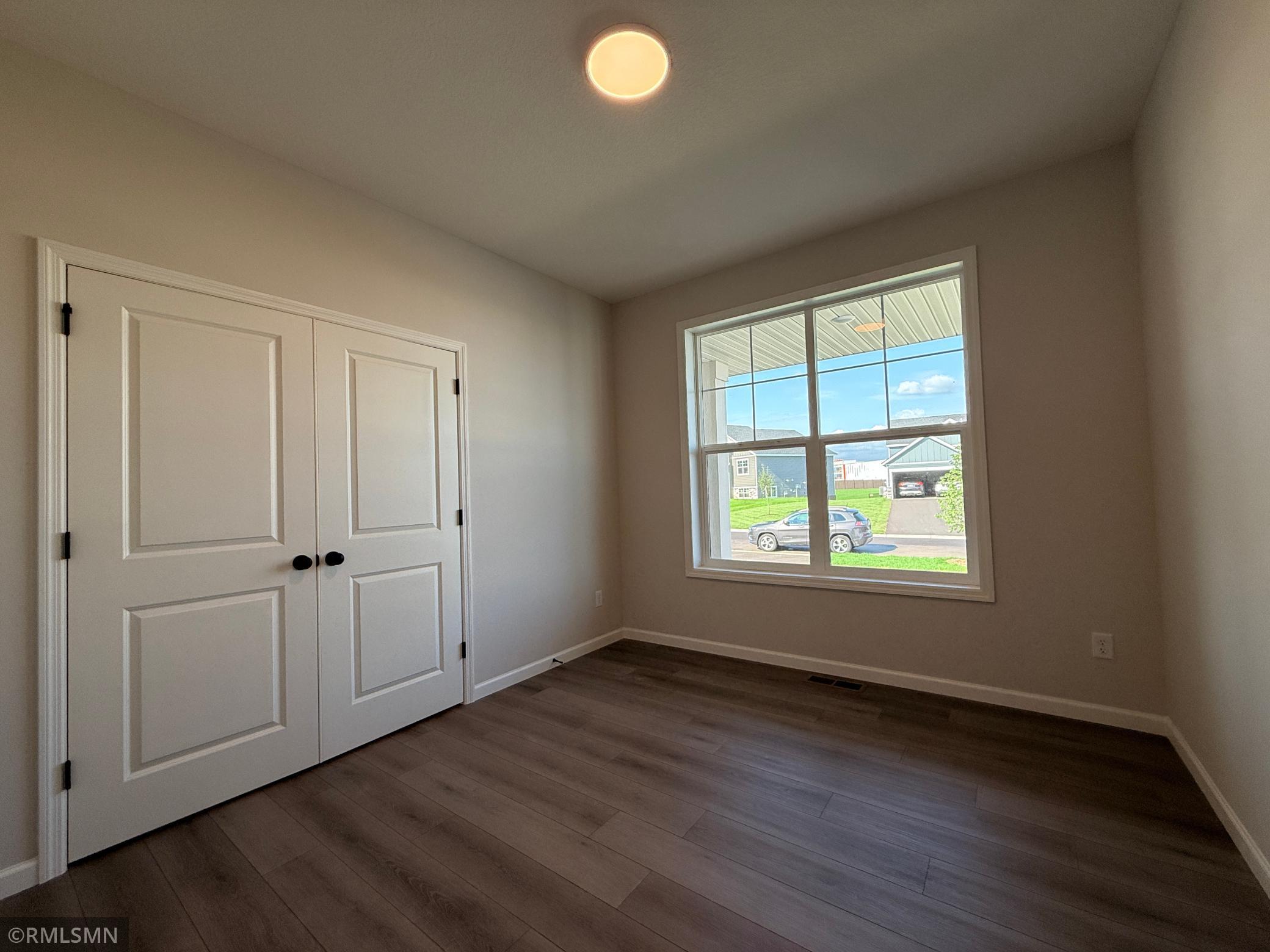 Providing a very versatile space with lots of natural light, the flex room is at the front of the home, right off the foyer