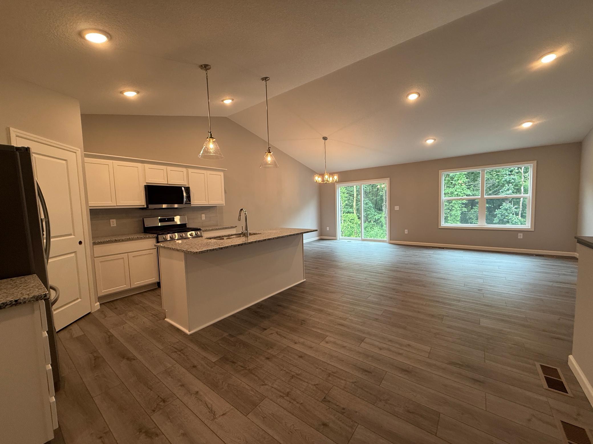 All photos of previously finished home of same floor plan.