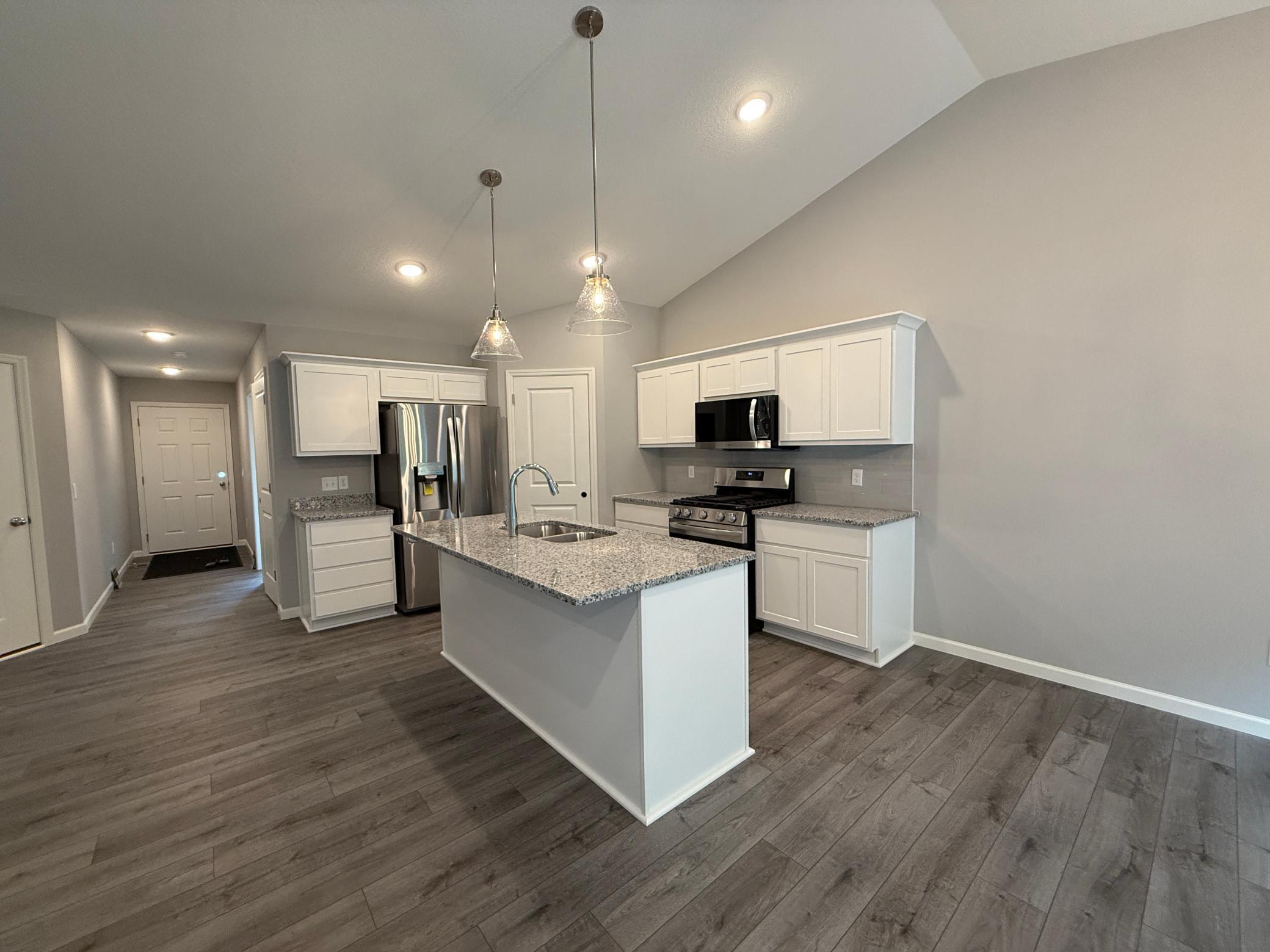 All photos of previously finished home of same floor plan.