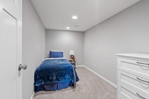 Head into the 6th non-conforming lower level bedroom. That can be also used as a hobby room, workout area, or large walk-in closet