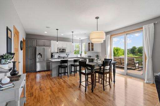 Informal dining area which overlooks the deck and backyard