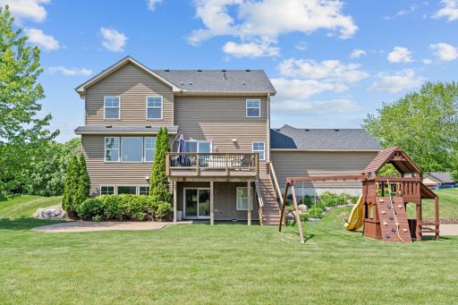 The backyard is a private oasis. It's spacious, flat, and overlooks the pond!