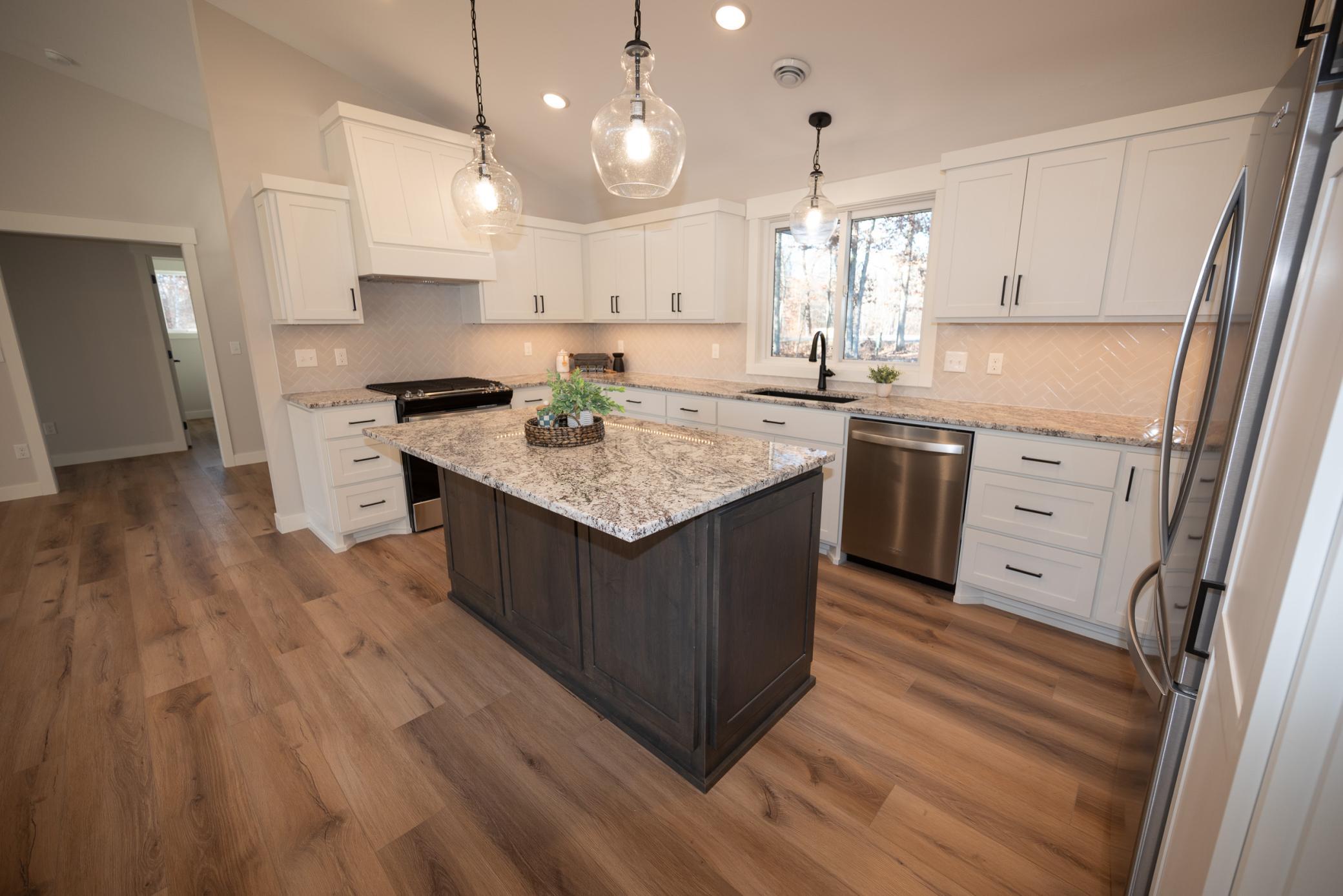 Gourmet style kitchen with custom built cabinets and granite counter!