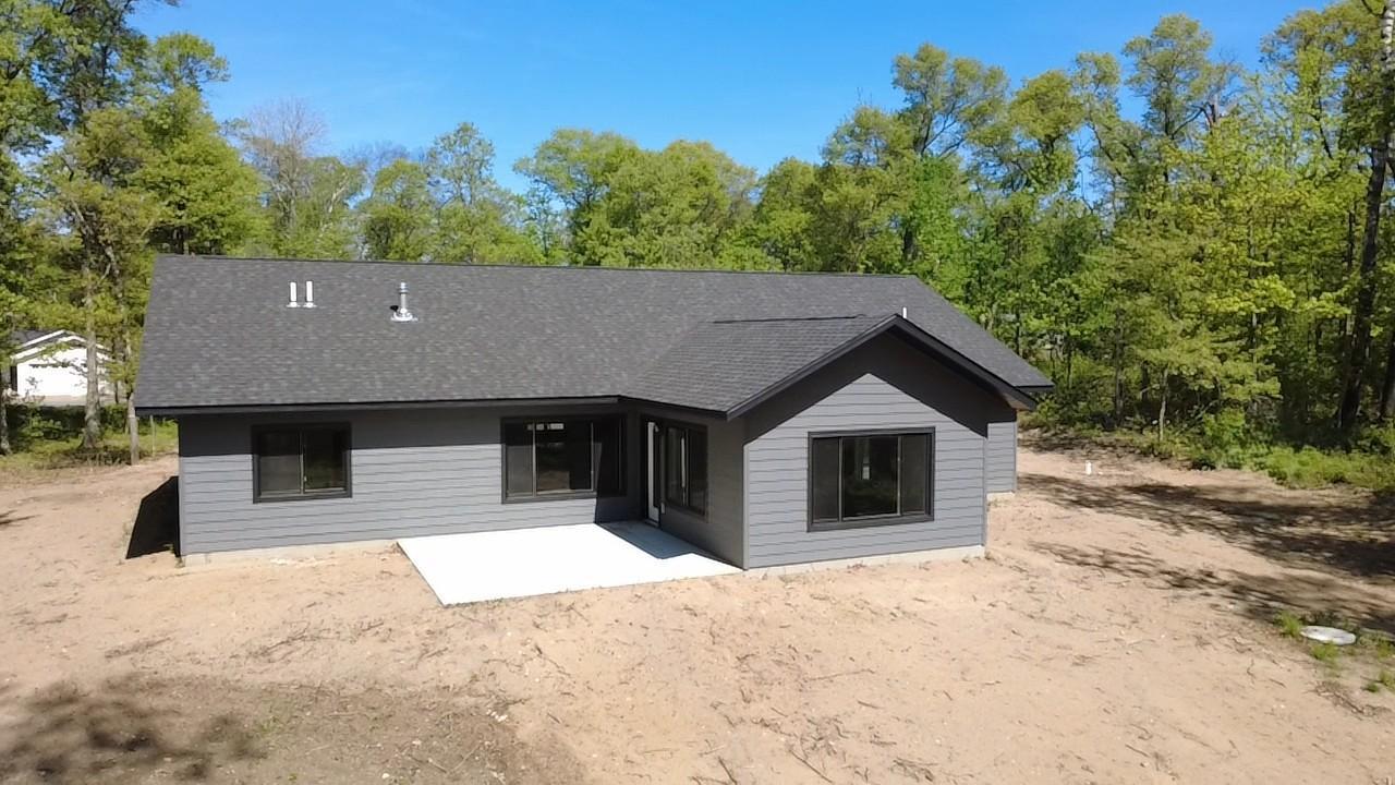 Back of house with concrete patio to enjoy!