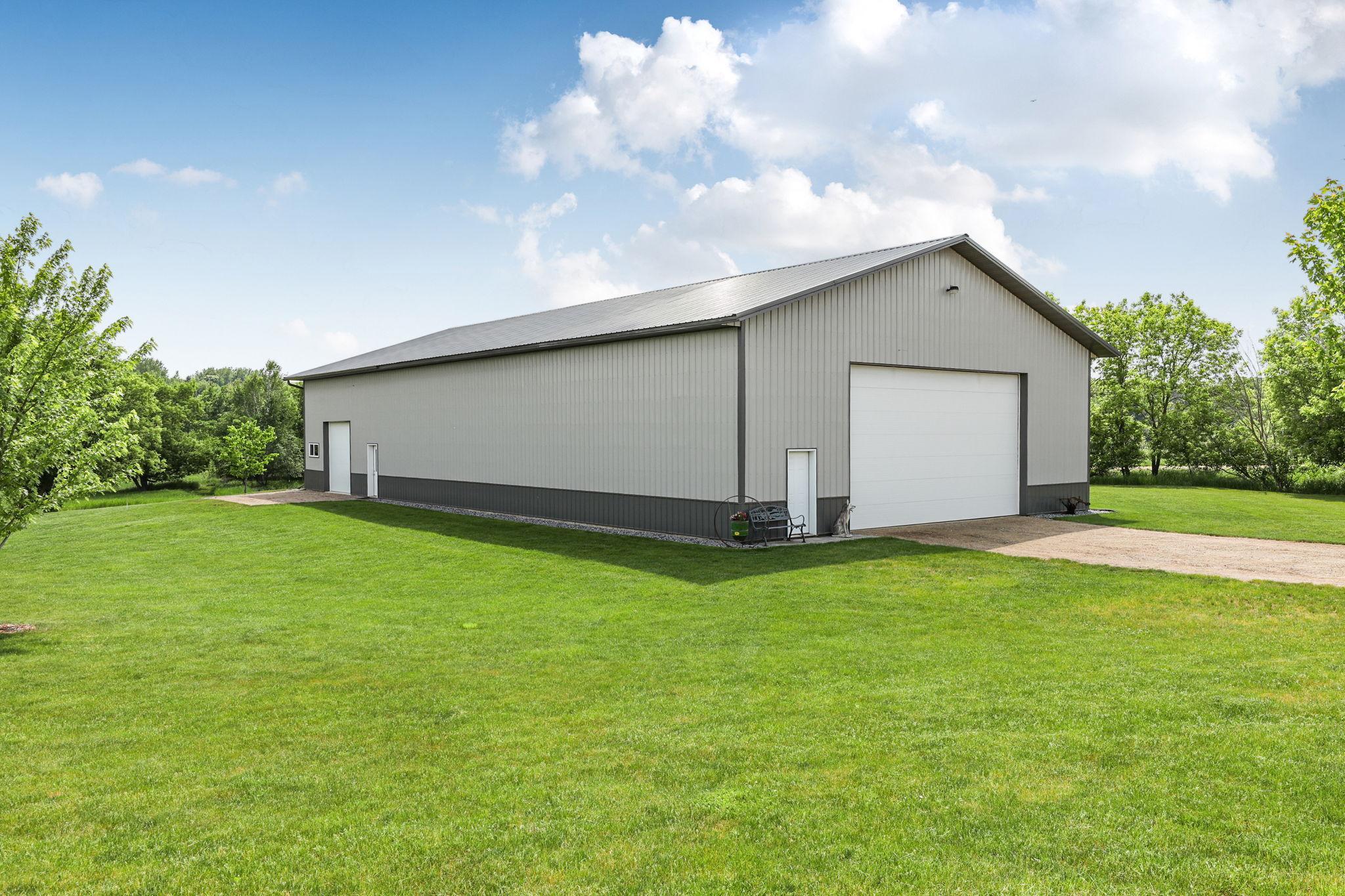 One side has a 26x14 garage door. The shop side has a 10x10 garage door. The uses and possibilities for this building are endless!