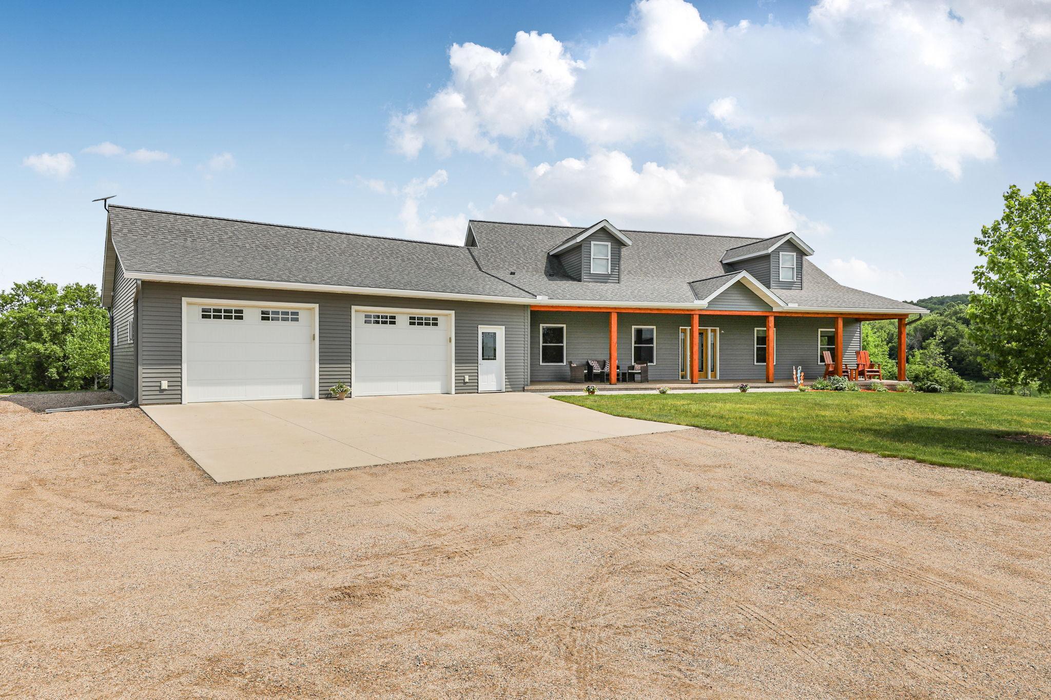 Over-sized (38x30) attached garage with in-floor heat and ceiling fans