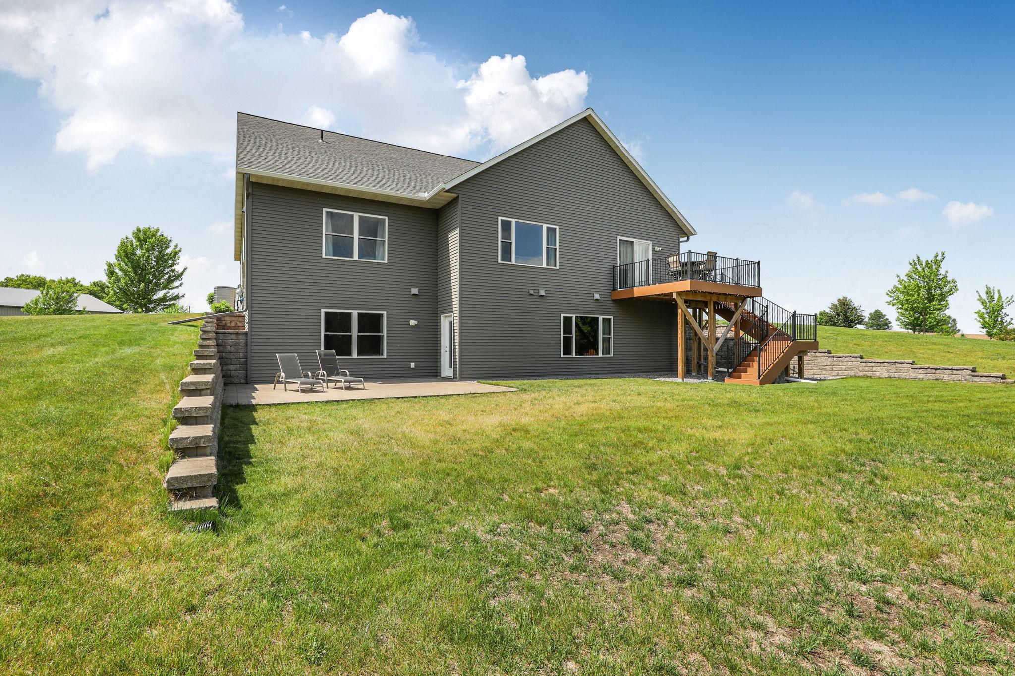 Choose between relaxing on the back deck or the paver 21x18 patio accessible from the family room in the lower level