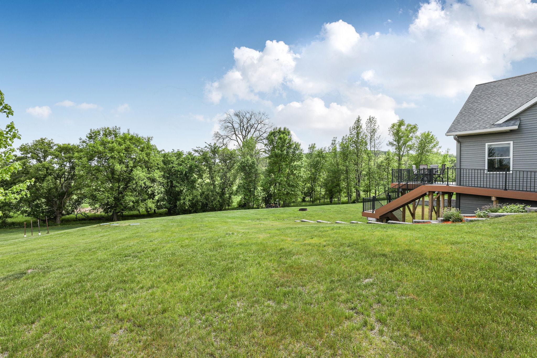 Nicely landscaped and maintained property. Back deck access from the garage service door, the lower level and the dining room