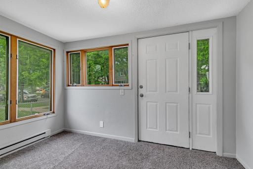 Inside, the enclosed front entry creates a warm welcome.