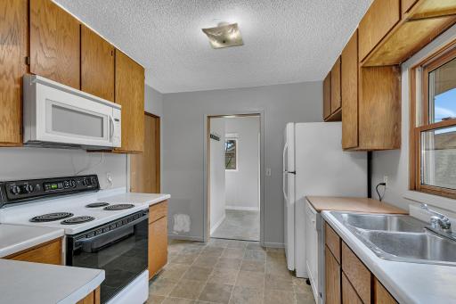 All kitchen appliances can remain with the home, including the dishwasher, range, microwave, and refrigerator, adding immediate convenience for the next owner.