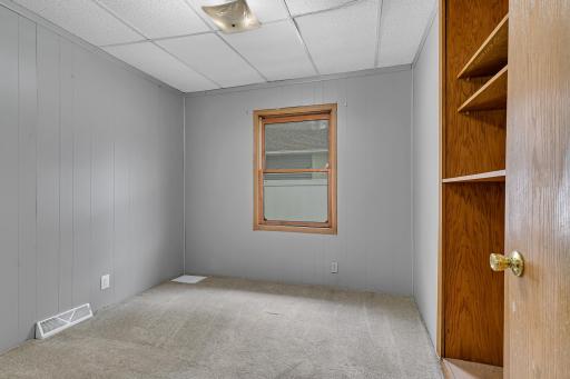 Main-level bedrooms provide comfortable living with easy accessibility, including a primary bedroom featuring a walk-in closet.