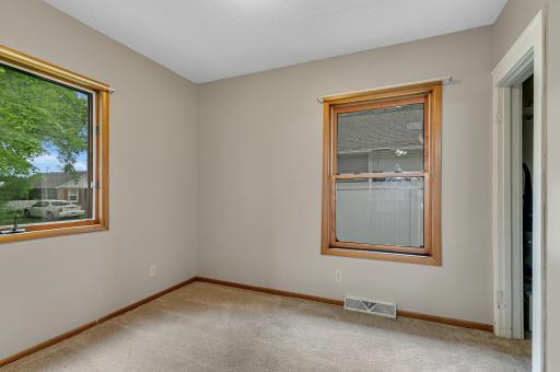 Here is the second main level bedroom with two windows to let in natural light and breezes.