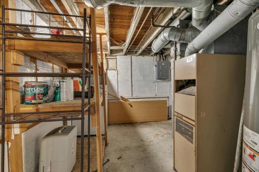 Additional features include a forced-air furnace, gas water heater, and a 100-amp breaker panel.