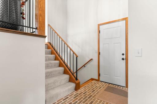 It features stunning brick flooring, updated in 2024.