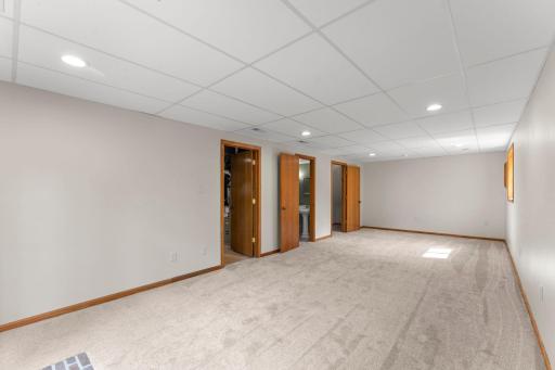 A framed second doorway already exists within the laundry space, and plumbing for a future basement shower is in place behind the wall, creating added flexibility for future finishing possibilities.