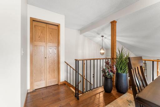 Modern railing details create an open, connected feel while still allowing for distinct gathering spaces.