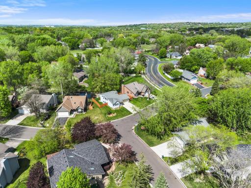 Nestled along a tree-lined street, this home blends comfort, character, and a peaceful natural setting with convenient access to nearby shopping, dining, parks, trails, and recreation areas, enhancing its exceptional lifestyle appeal.