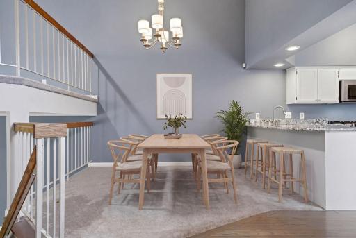 Main level dining area. (virtually staged)