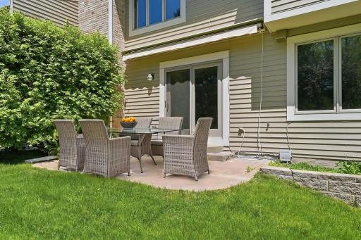 Plantings provide excellent natural fencing for privacy on the patio. (virtually staged)