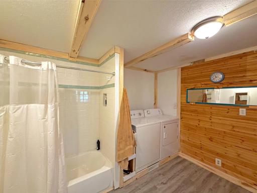 The conveniently integrated laundry area maximizes functionality while keeping everyday chores within easy reach.