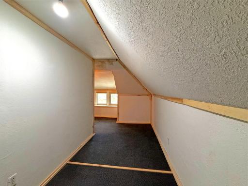 The upper level offers flexible living space that can easily adapt to your needs - use as an office or even a hobby room.