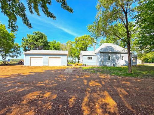 Step outside to a recently added paver stepping stones that connects the home to the brand-new double detached garage.