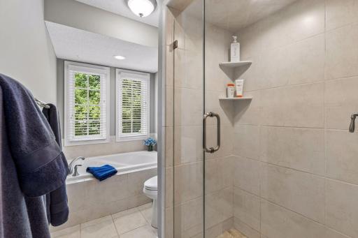 Walk-in shower and separate soaking bathtub