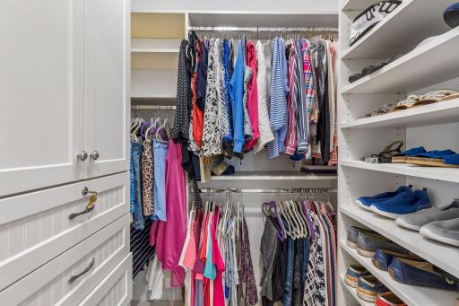 Her closet with organziational components