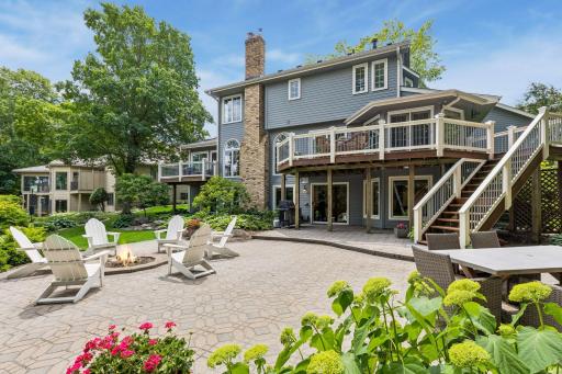Easily entertain on the TWO decks, balcony, wall-out patio, or step down to the lake